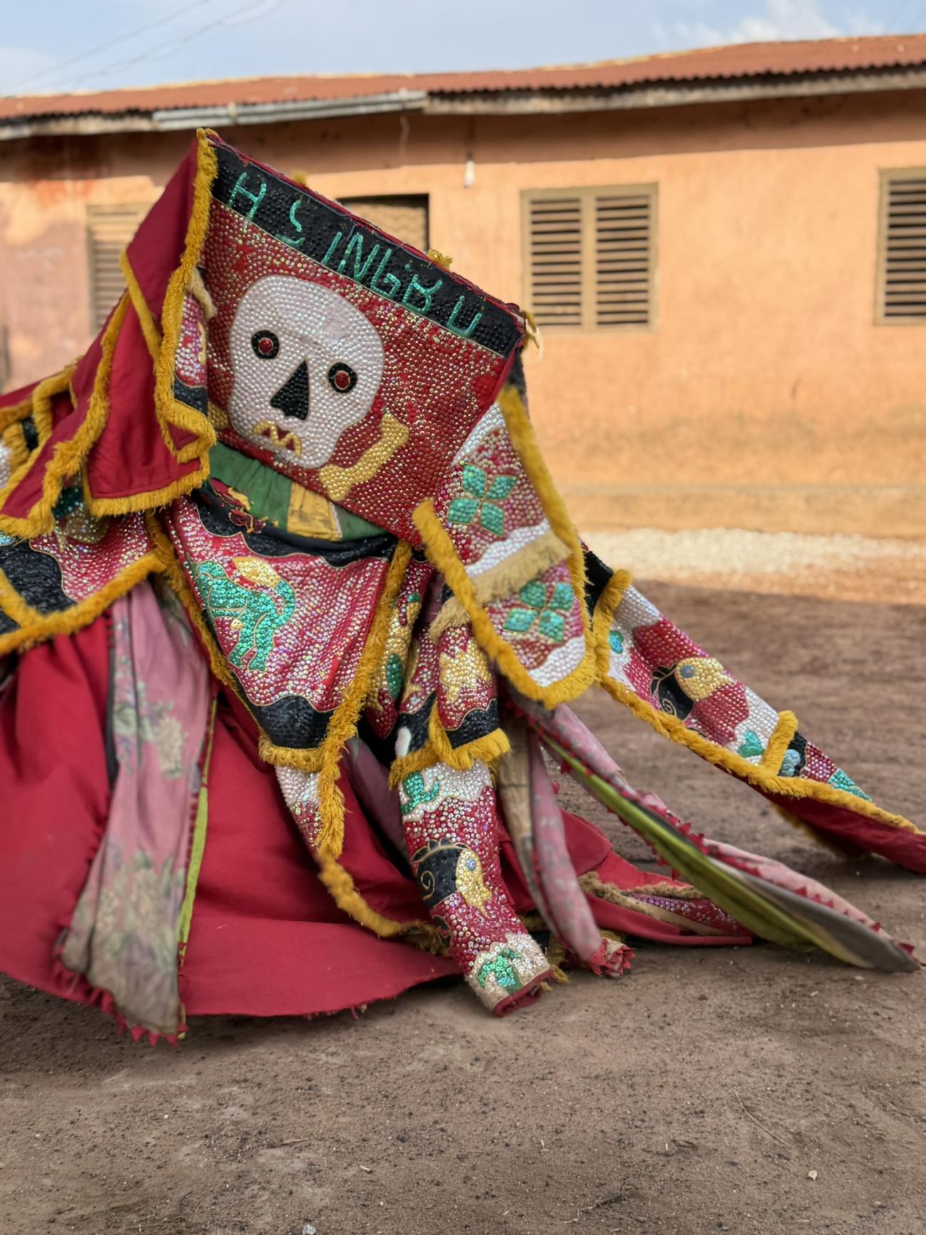 Photo of egun dancing masks in Benin